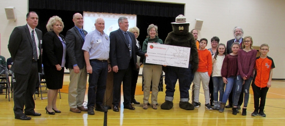 Mr. Bazler accepts check from ODNR